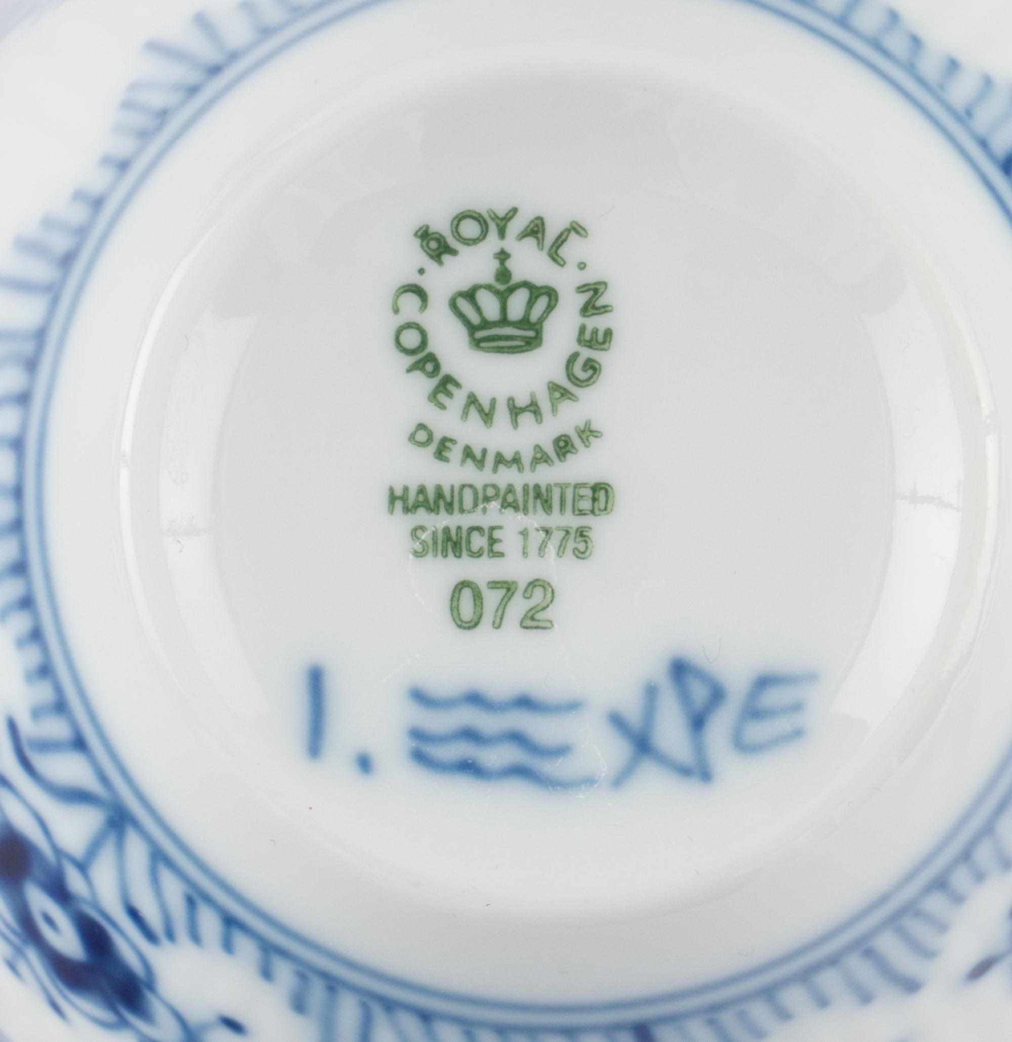A Group of Royal Copenhagen Blue Fluted Teacups and Saucers