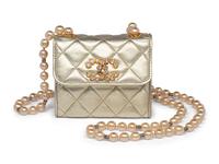 Chanel Mini Bag in Quilted Lambskin with Faux Pearl Strap