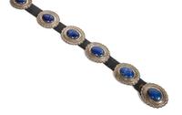 A Southwestern Silver and Blue Hard Stone Concho Belt Length overall 50 inches