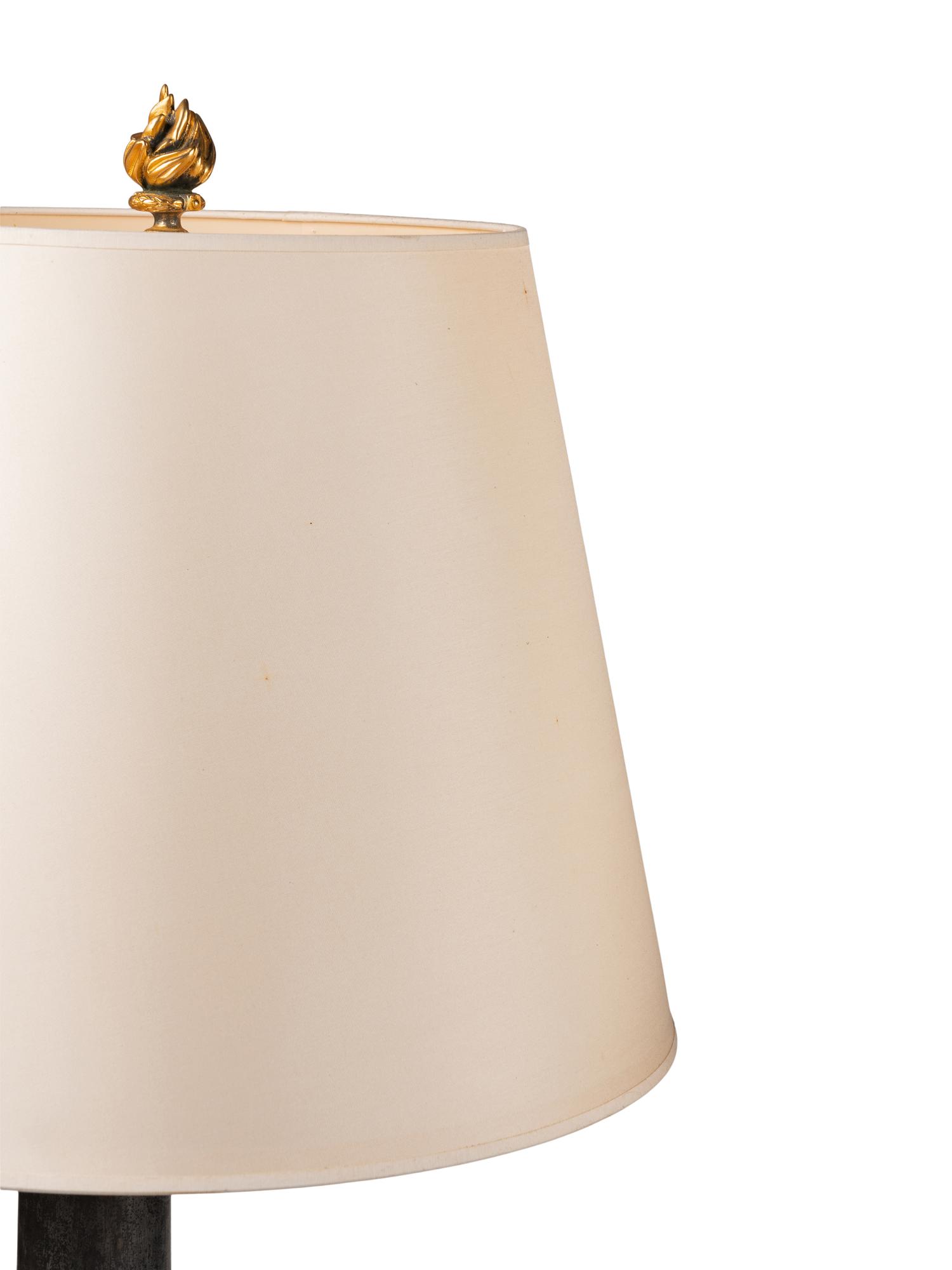 A Pair of French Gilt Bronze and Steel Columnar Lamps