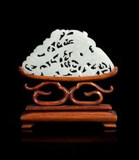 A White Jade Reticulated Plaque Jade width 3 3/4 inches. — 19TH CENTURY