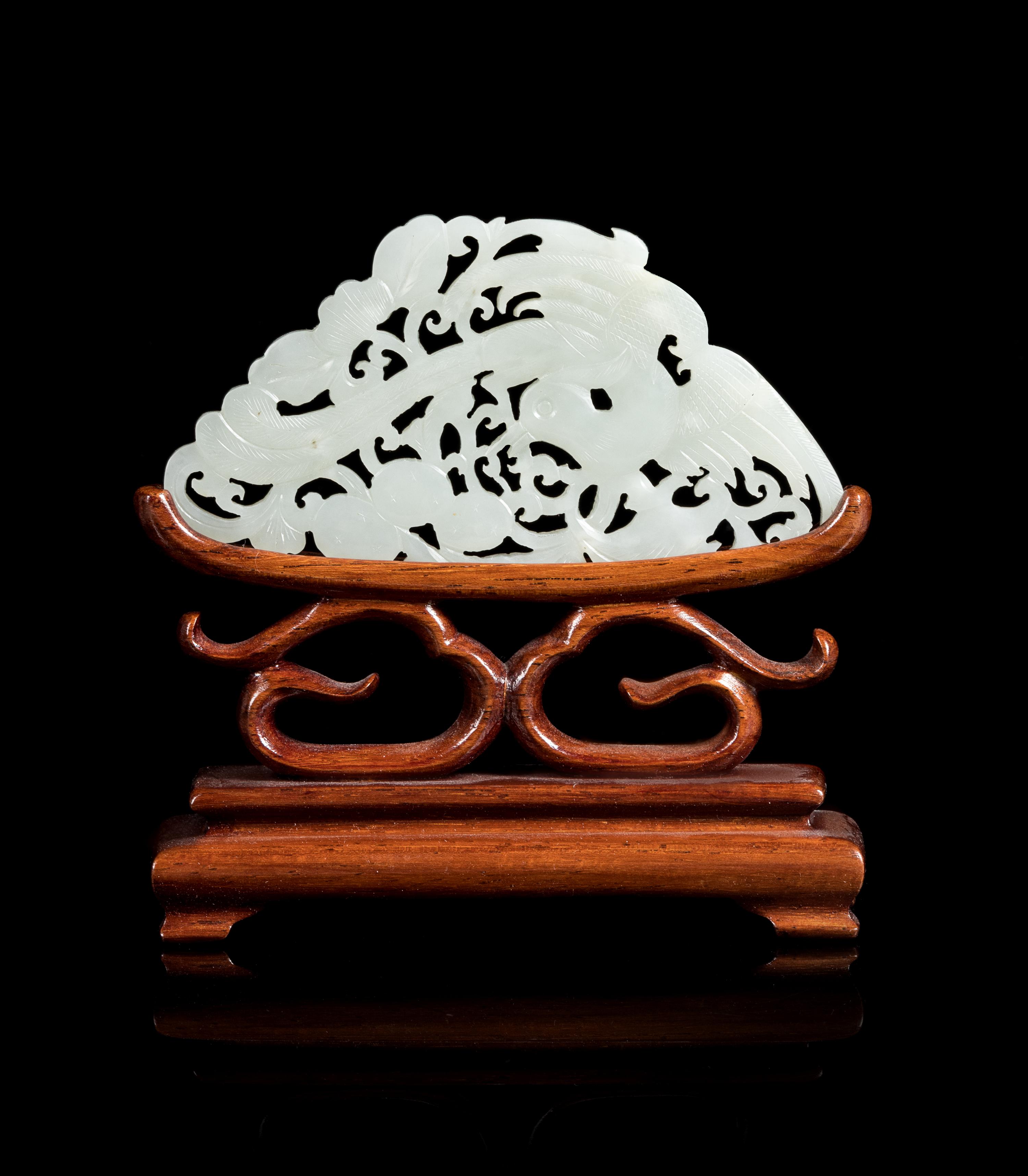 A White Jade Reticulated Plaque Jade width 3 3/4 inches. — 19TH CENTURY