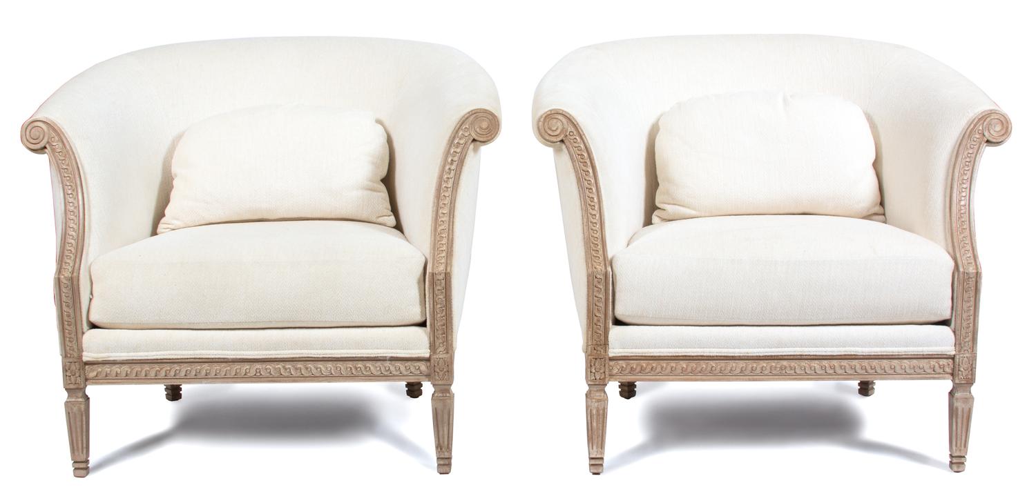 A Pair of Louis XVI Style Upholstered Bergeres Height 34 x width 38 x depth 32 inches. — 20TH CENTURY