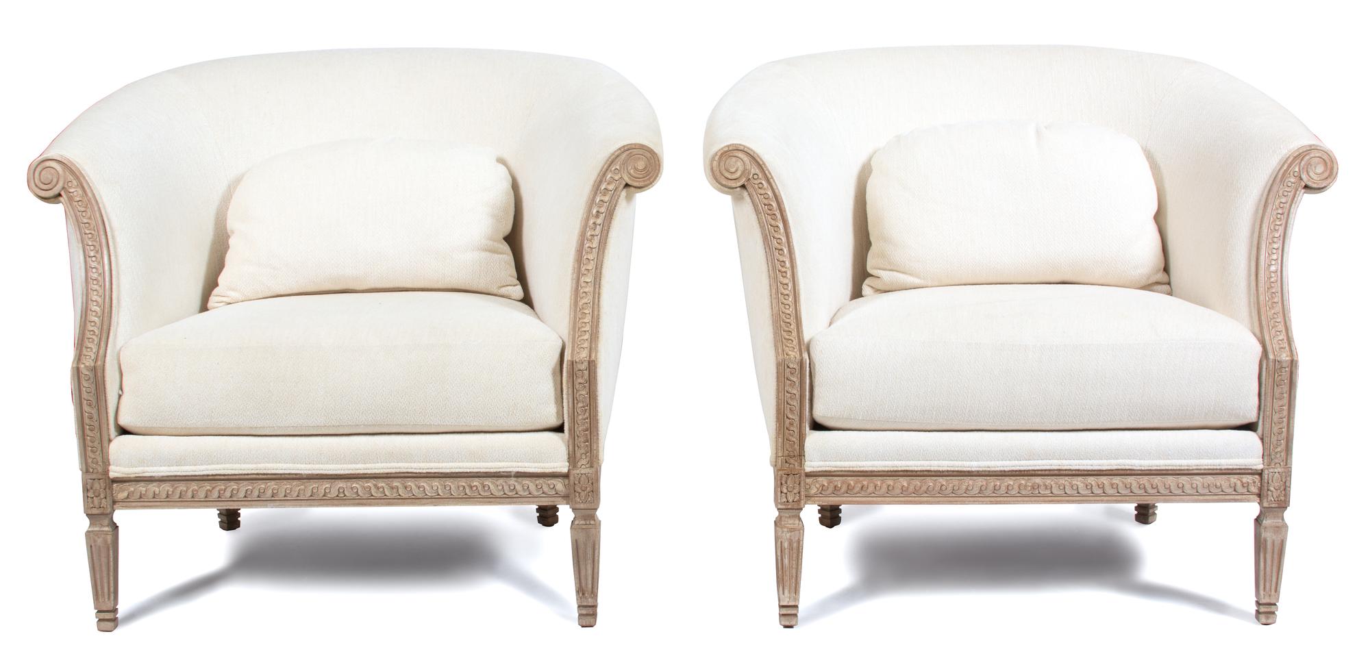 A Pair of Louis XVI Style Upholstered Bergeres Height 34 x width 38 x depth 32 inches. — 20TH CENTURY