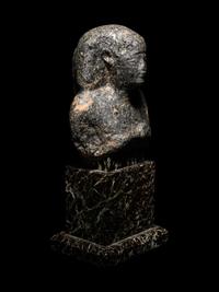 An Egyptian Granite Bust of a Man