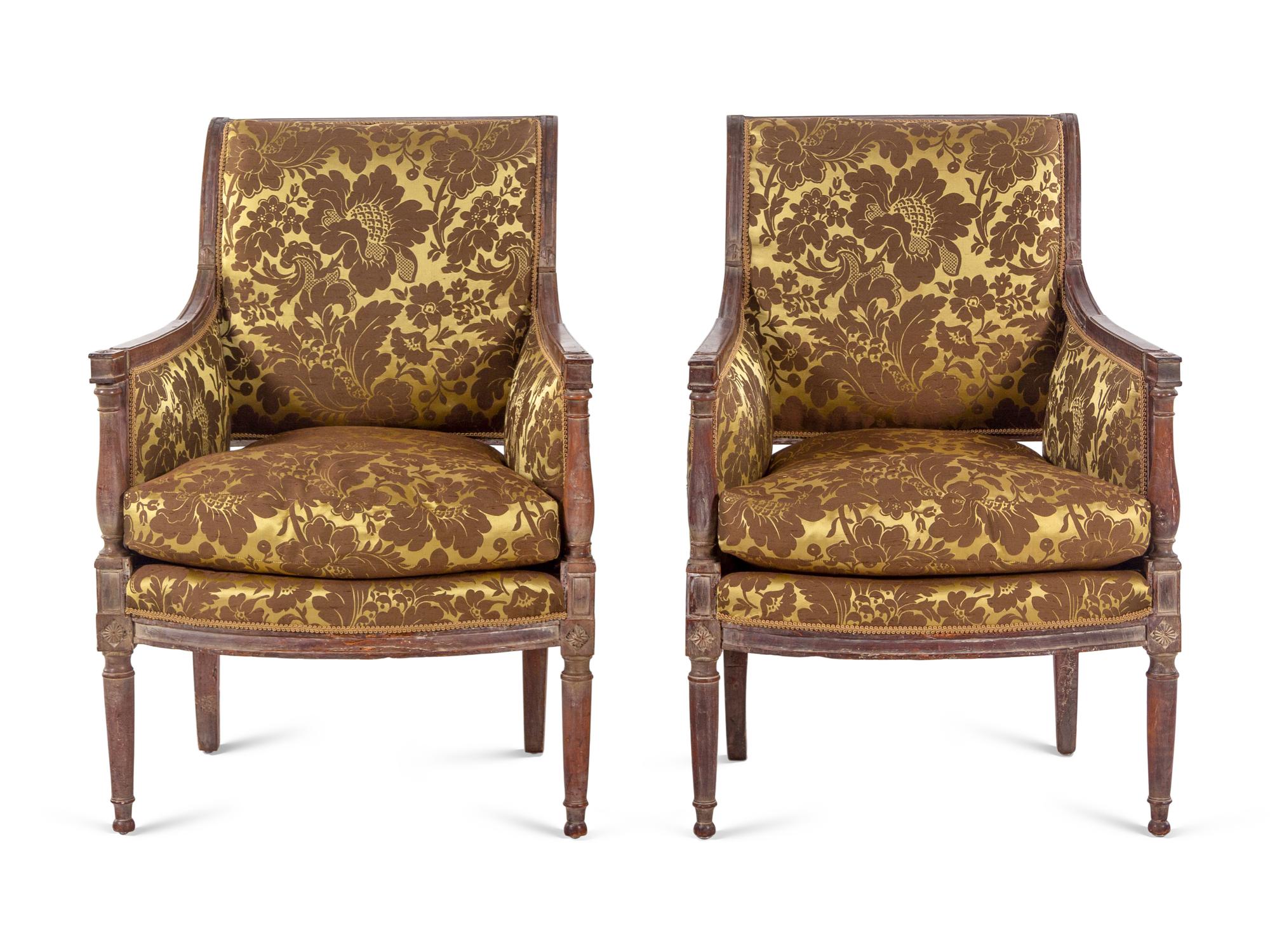 A Pair of Directoire Walnut Bergères