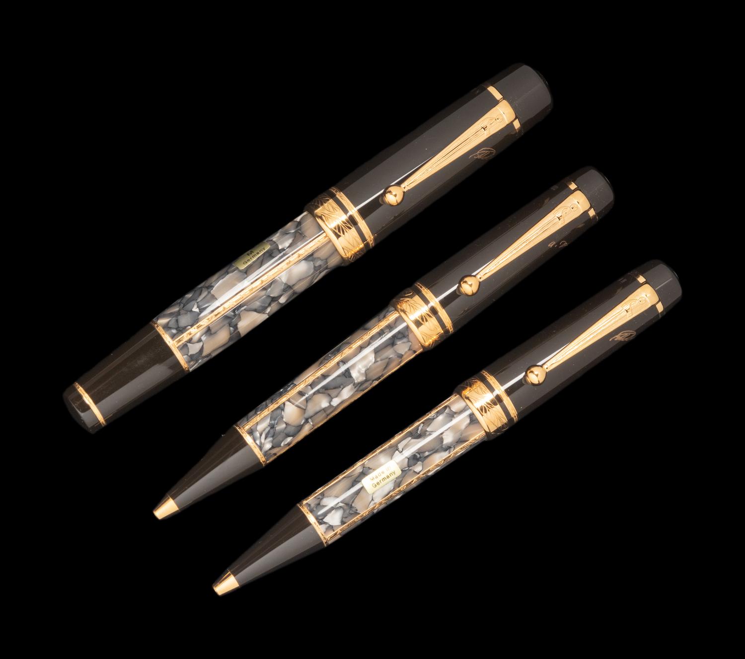 A Montblanc Limited Edition Alexandre Dumas Fountain Pen and Two Rollerball Pen Set