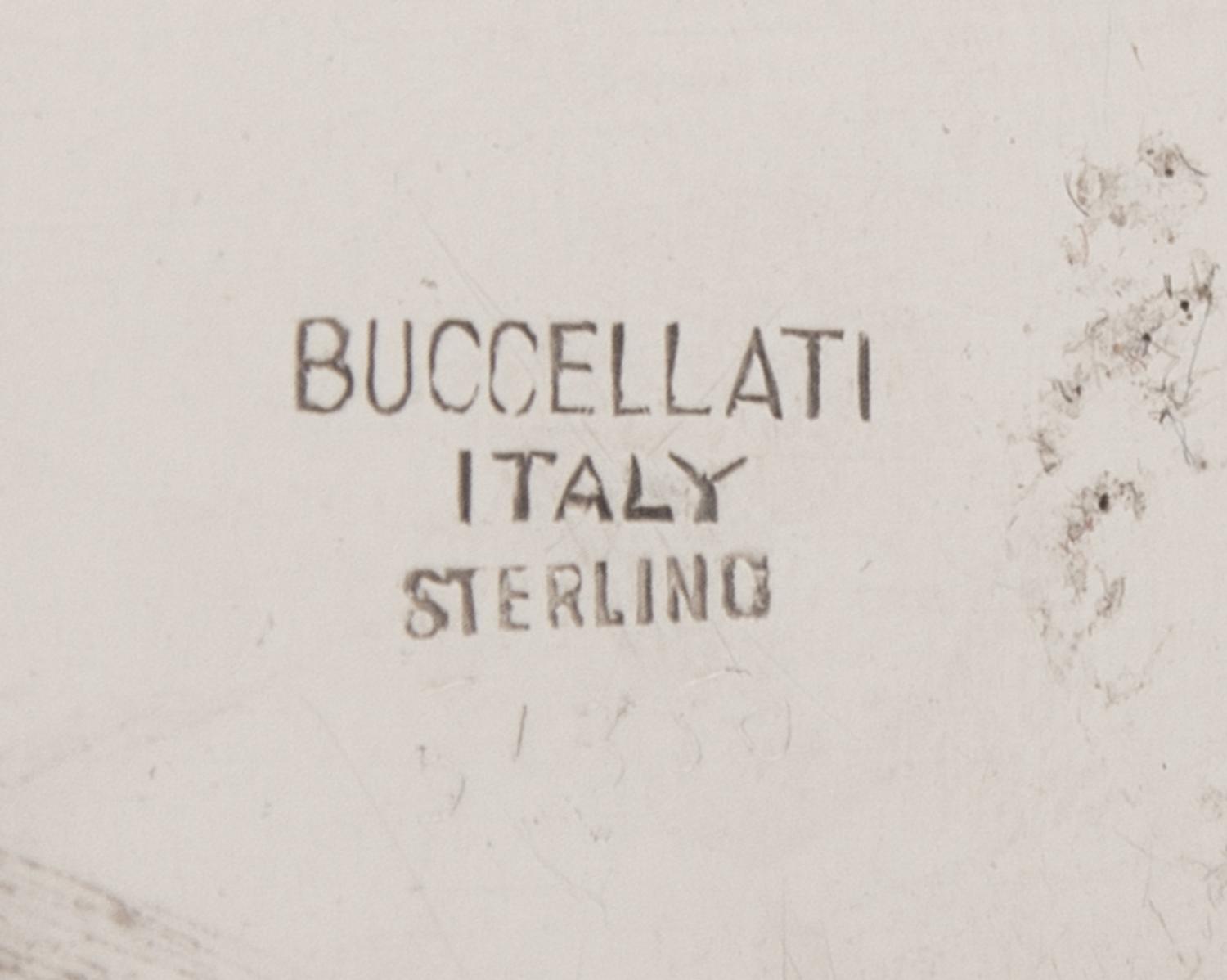An Italian Silver Wine Taster, Buccellati, Milan, 20th Century, having twin scallop-form handles and a lobed body.