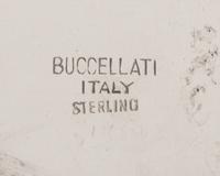 An Italian Silver Wine Taster, Buccellati, Milan, 20th Century, having twin scallop-form handles and a lobed body.