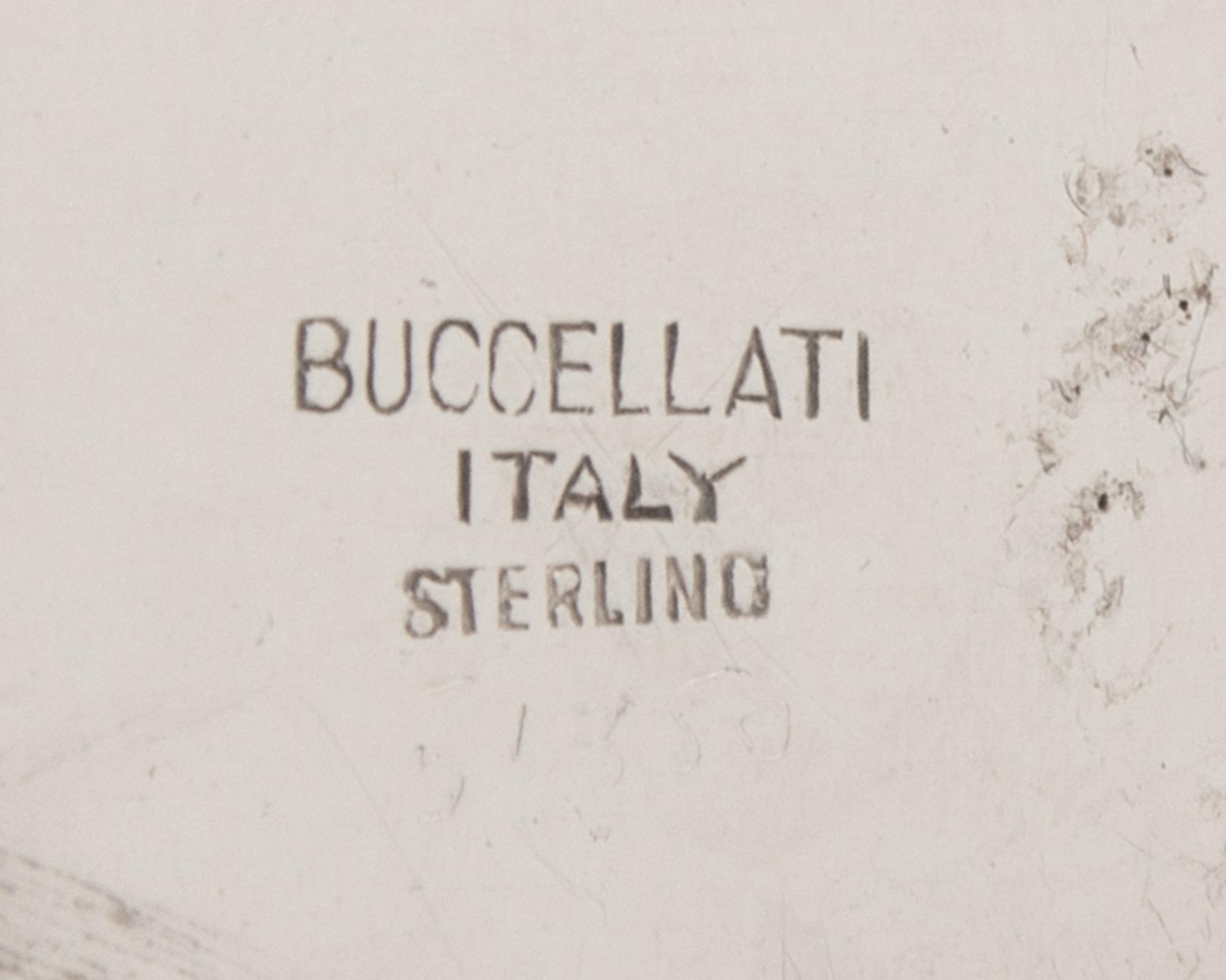 An Italian Silver Wine Taster, Buccellati, Milan, 20th Century, having twin scallop-form handles and a lobed body.