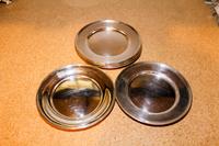 An Assembled Set of American Silver Bread Plates Diameter of largest 6 1/2 inches. — 20TH CENTURY