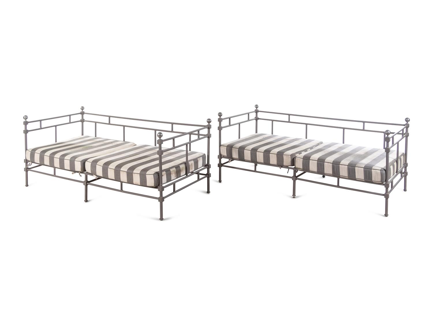A Pair of Painted Metal Patio Sofas
