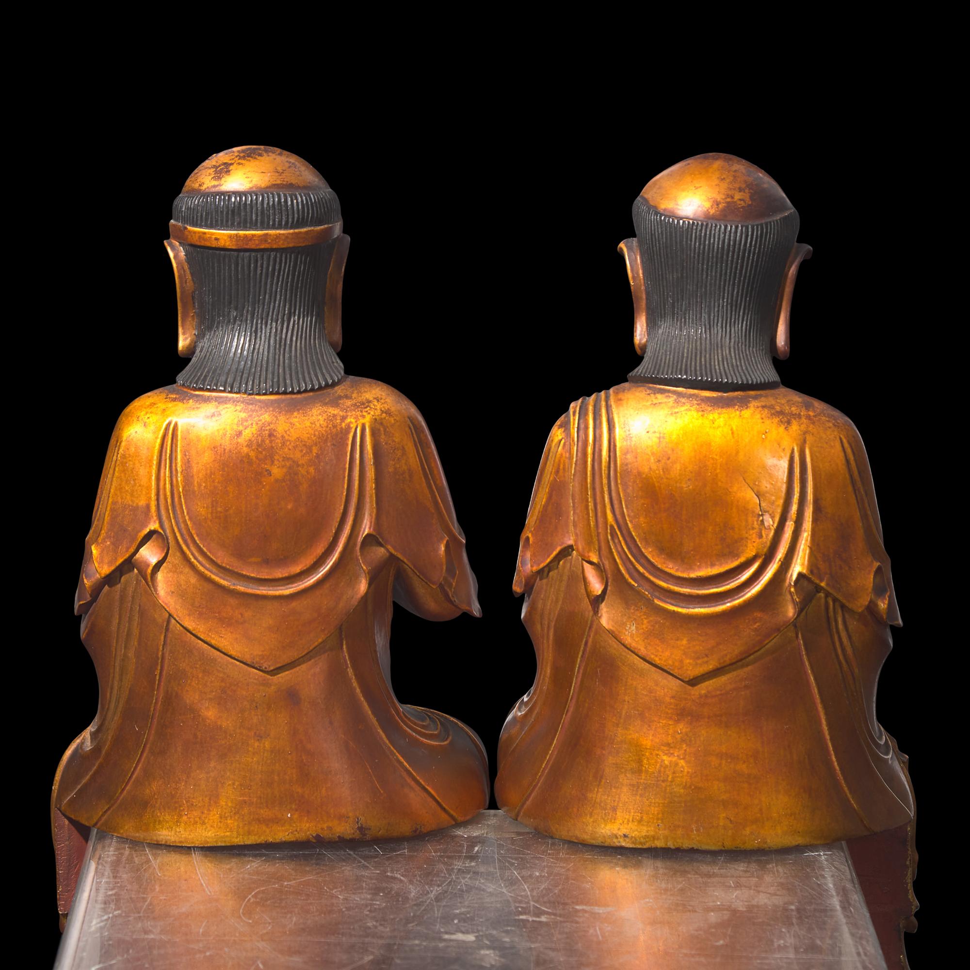 A Pair of Chinese Gilt Lacquered Wood Luohan Figures 木漆金羅漢兩尊