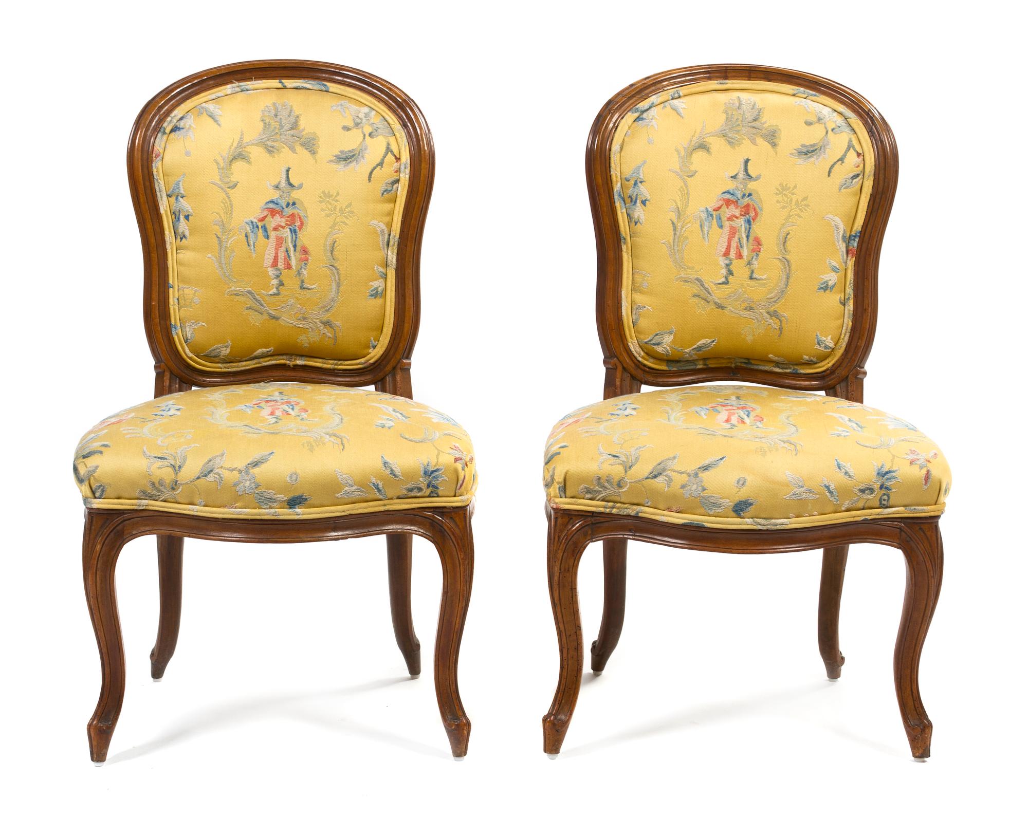 A Pair of Louis XV Style Walnut Side Chairs, Height 35 inches.