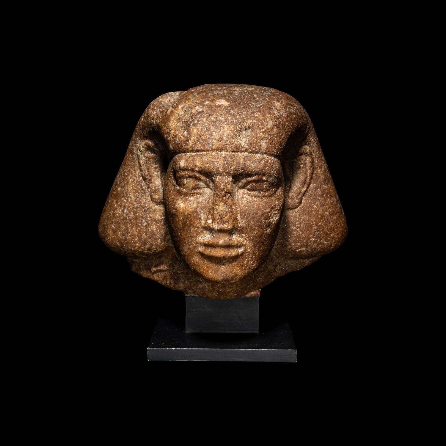 An Egyptian Granite Head of a Scribe