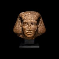 An Egyptian Granite Head of a Scribe