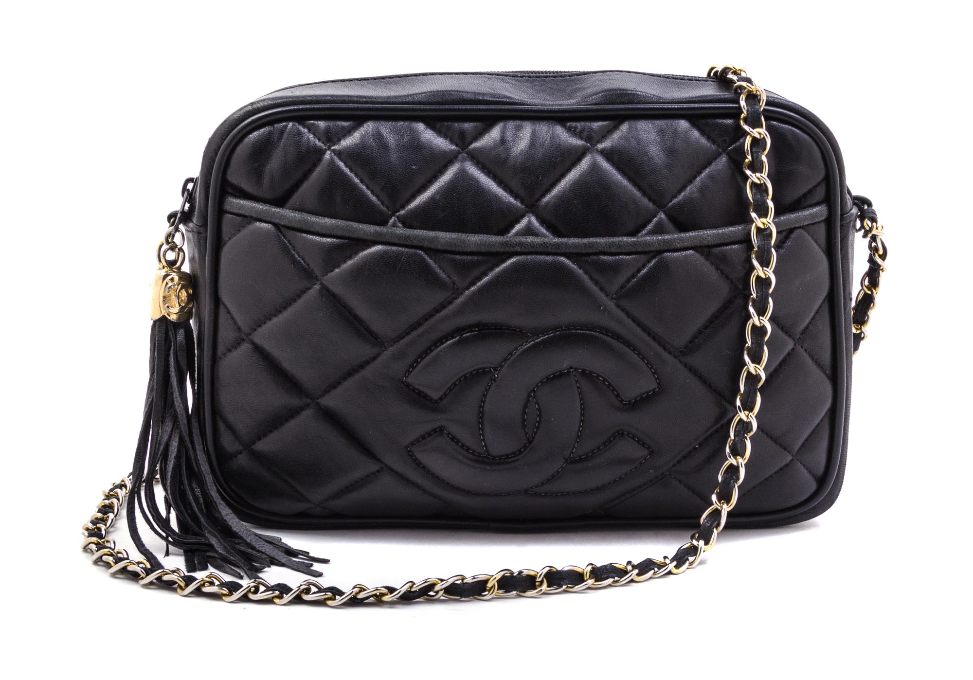 A Chanel Black Caviar Leather Handbag, 10" x 7" x 2.5".