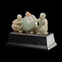A Chinese Green Jadeite Figural Group of Monkeys and Peach