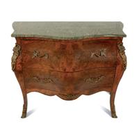 A Louis XV Style Gilt Metal Mounted Marble Top Bombe Commode