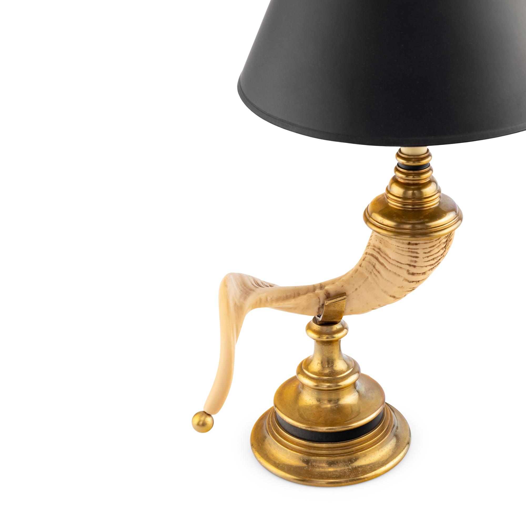 A Taxidermy Horn Mounted as a Lamp