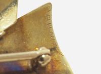 A Yellow Gold and Aquamarine Brooch and Ring