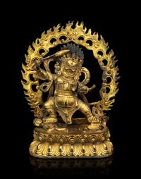 A Sino-Tibetan Gilt Bronze Figure of Mahākāla