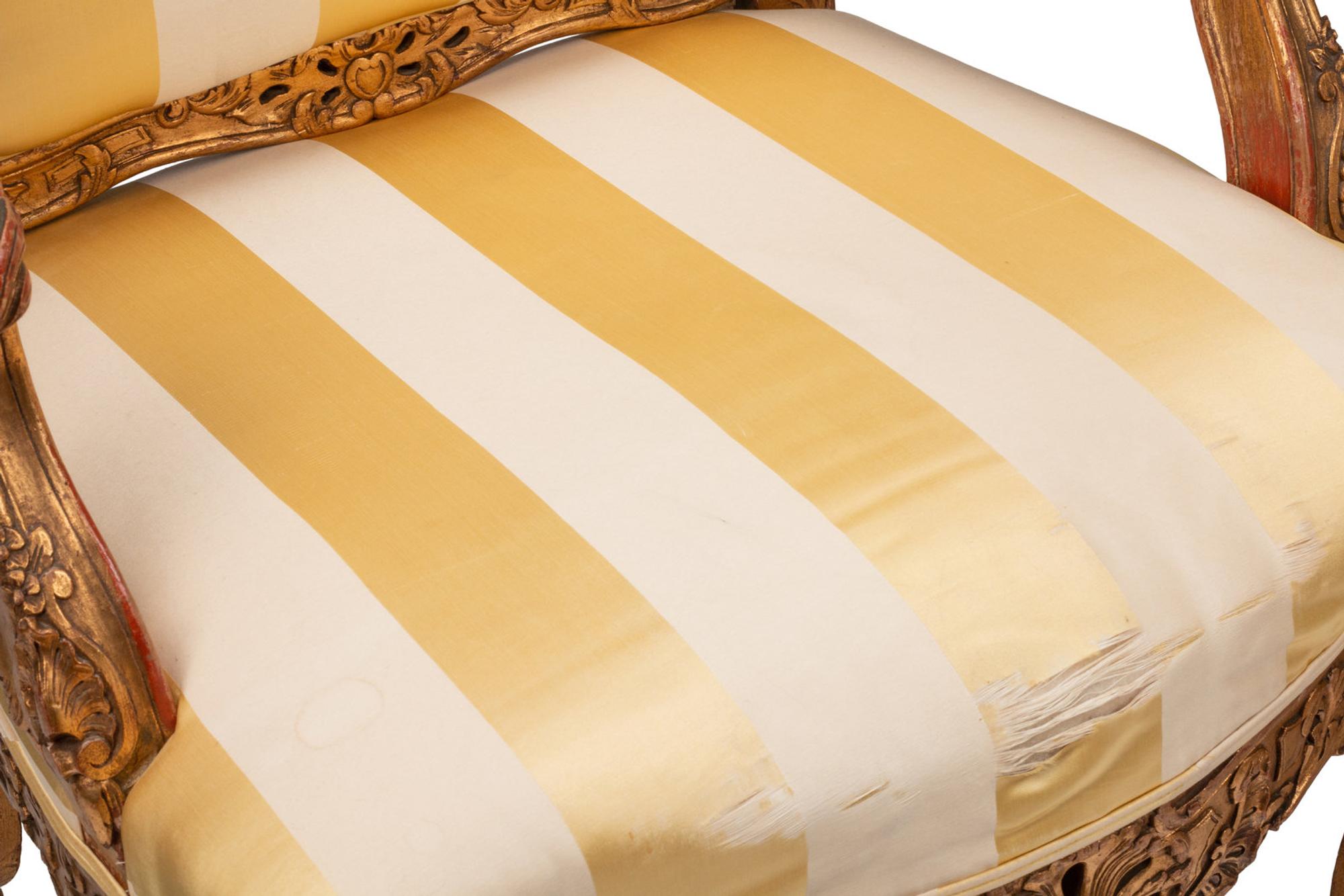 A Pair of Régence Style Giltwood Fauteuils