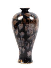 A Jizhou Style Black Glazed Russet Splashed Stoneware Vase Height 9 inches.