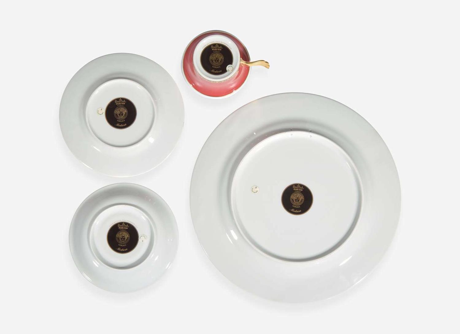 A Versace enameled porcelain part dinner service in the "Medusa" pattern, produced by Rosenthal Studio Line, Germany, modern