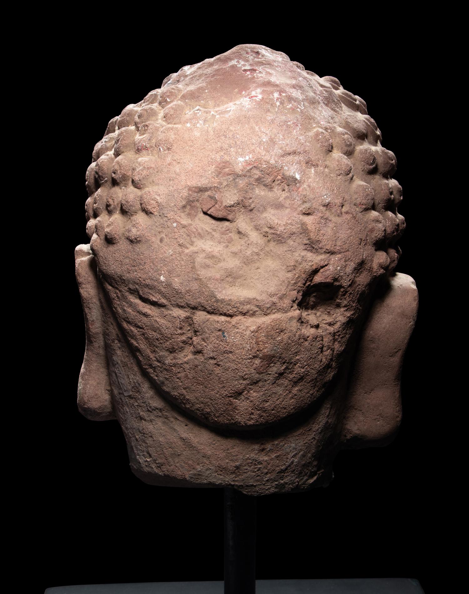 A Pair of Chinese Carved Stone Heads of Buddha