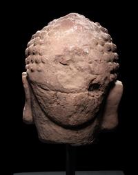 A Pair of Chinese Carved Stone Heads of Buddha