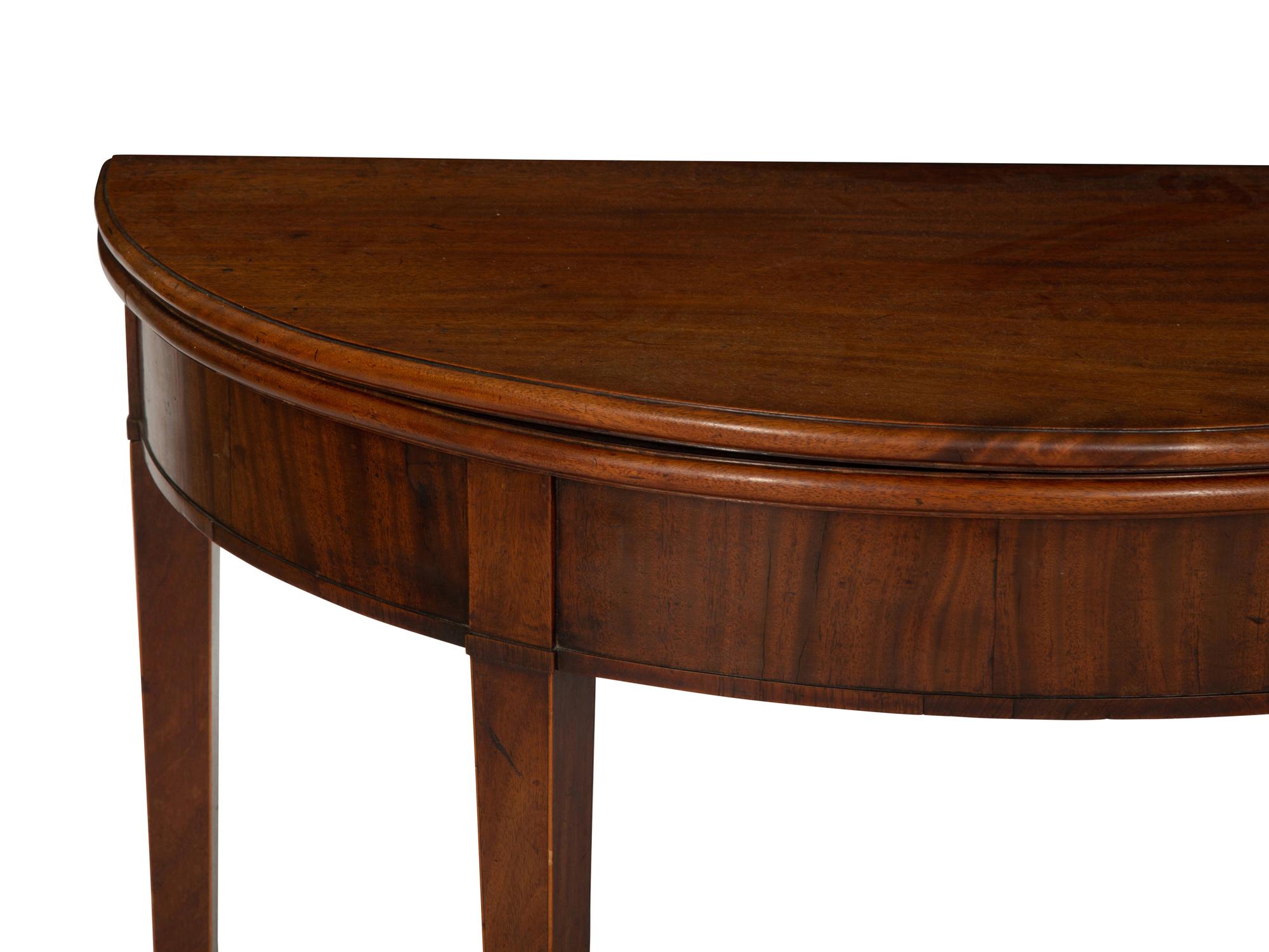 A George III Mahogany Demilune Flip Top Card Table