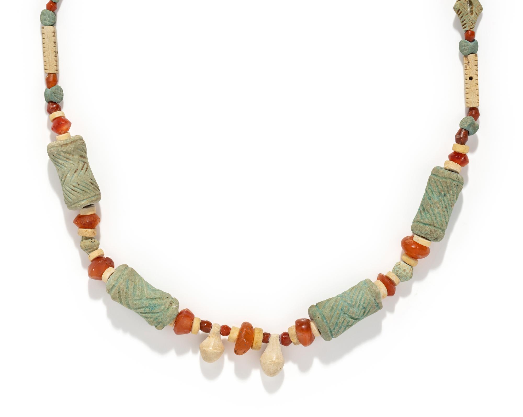 A Near Eastern Faience and Carnelian Bead Necklace