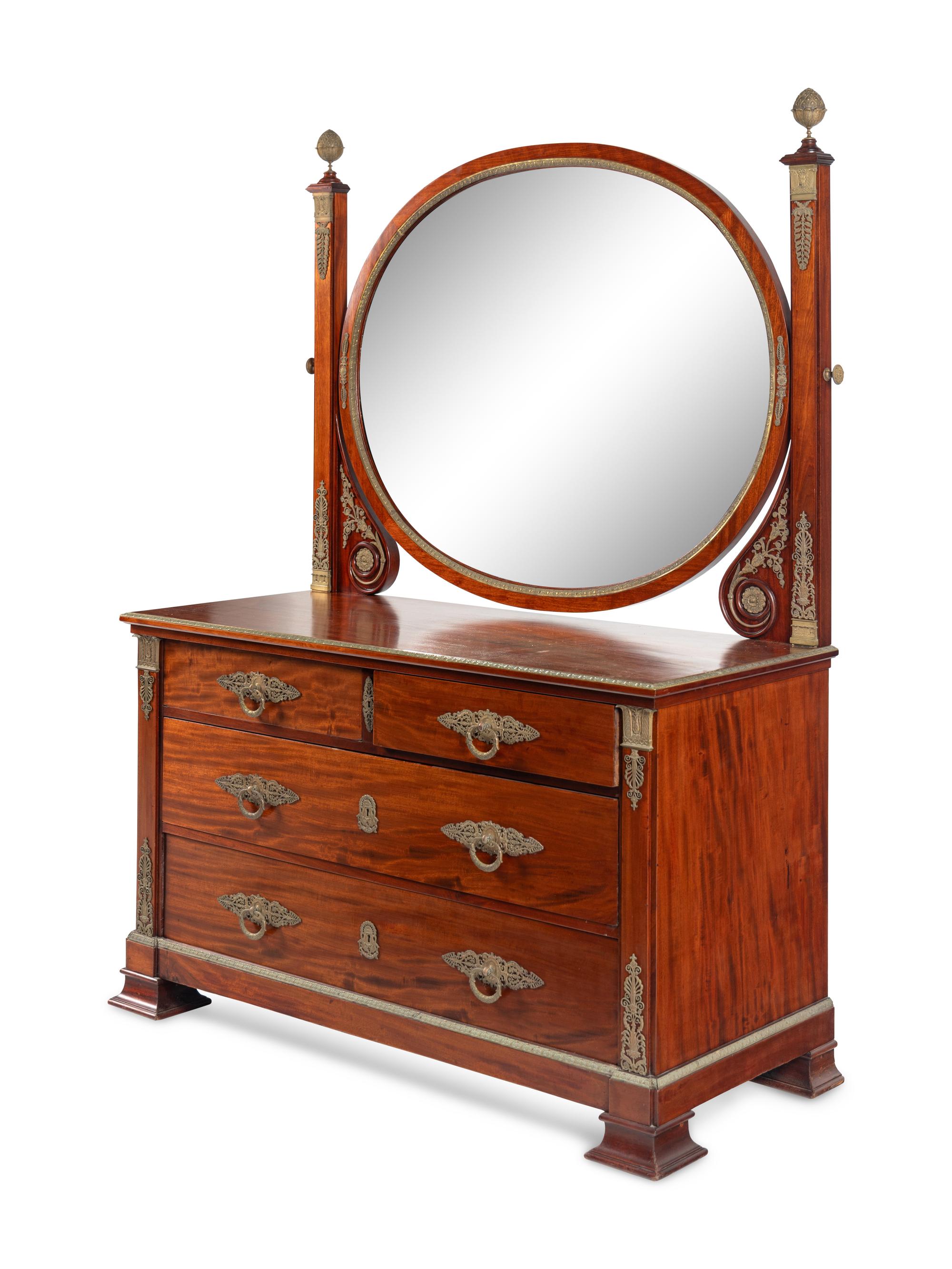 An Empire Style Gilt Bronze Mounted Mahogany Chest of Drawers with Dressing Mirror