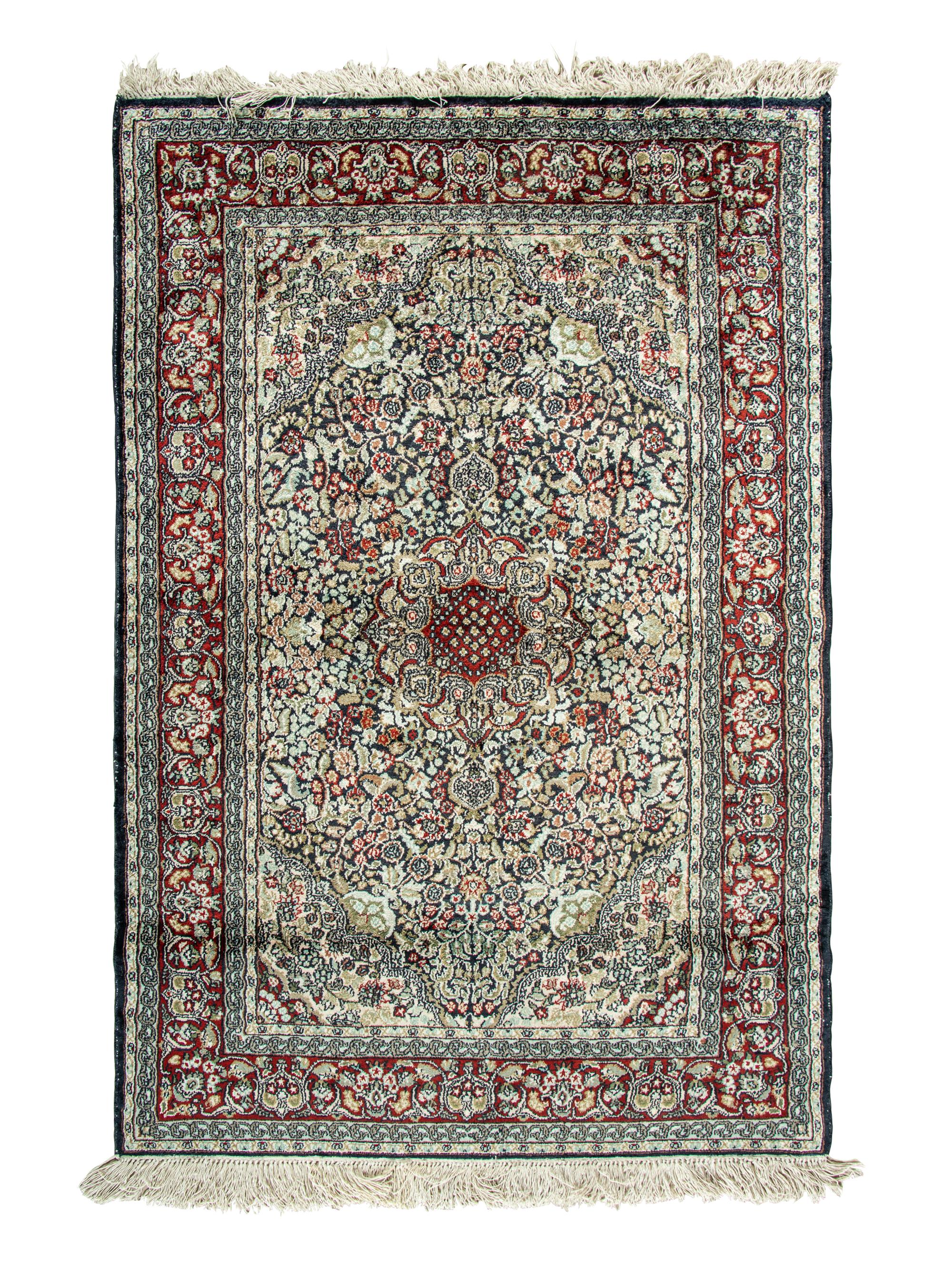 A Silk Tabriz Rug