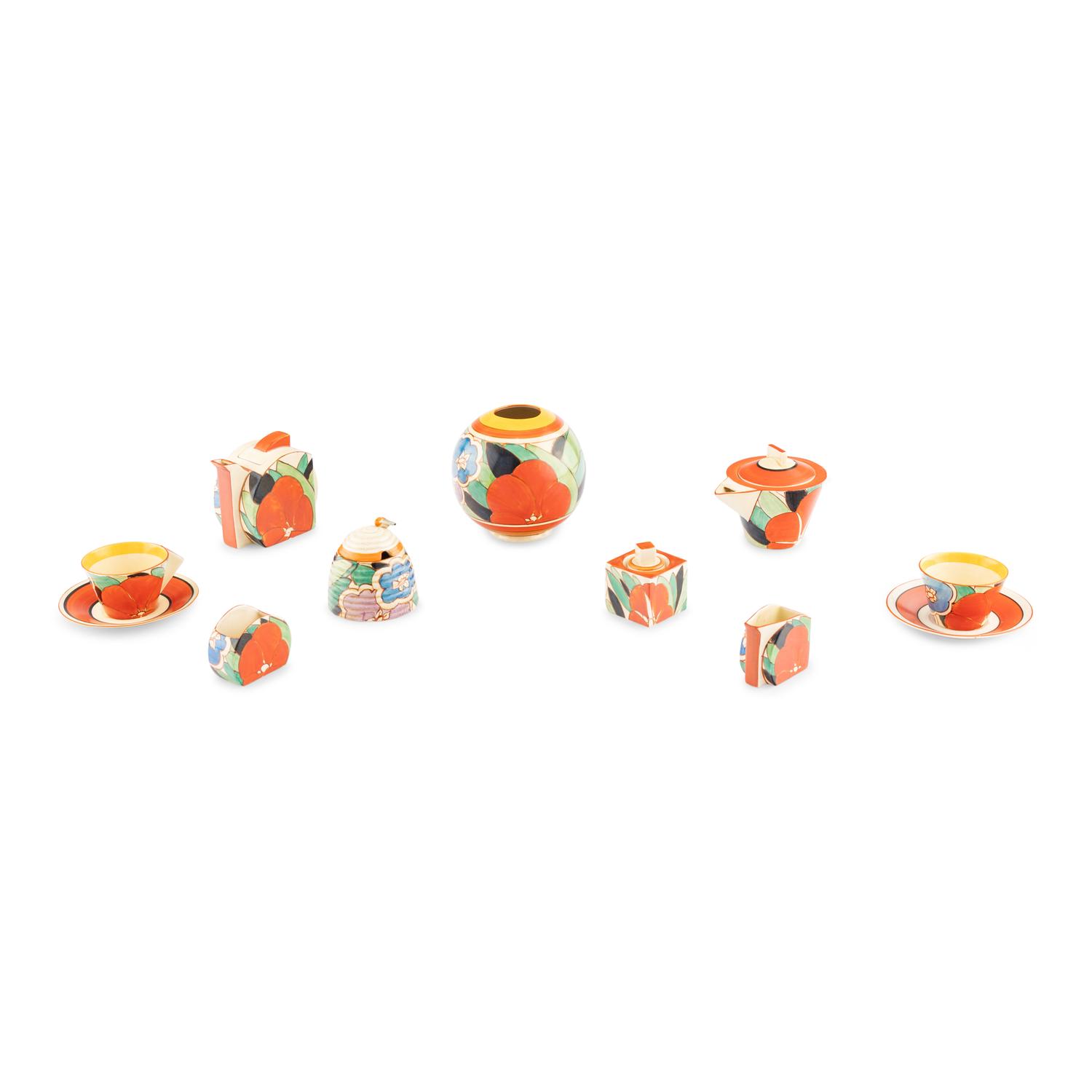 A Group of Nine Clarice Cliff Gardenia Ceramic Table Articles