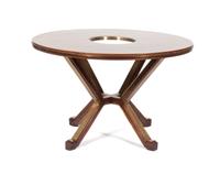 A Dining Table Diameter 47 1/2 inches. — ATTRIBUTED TO FONTANA ARTE, CIRCA 1950