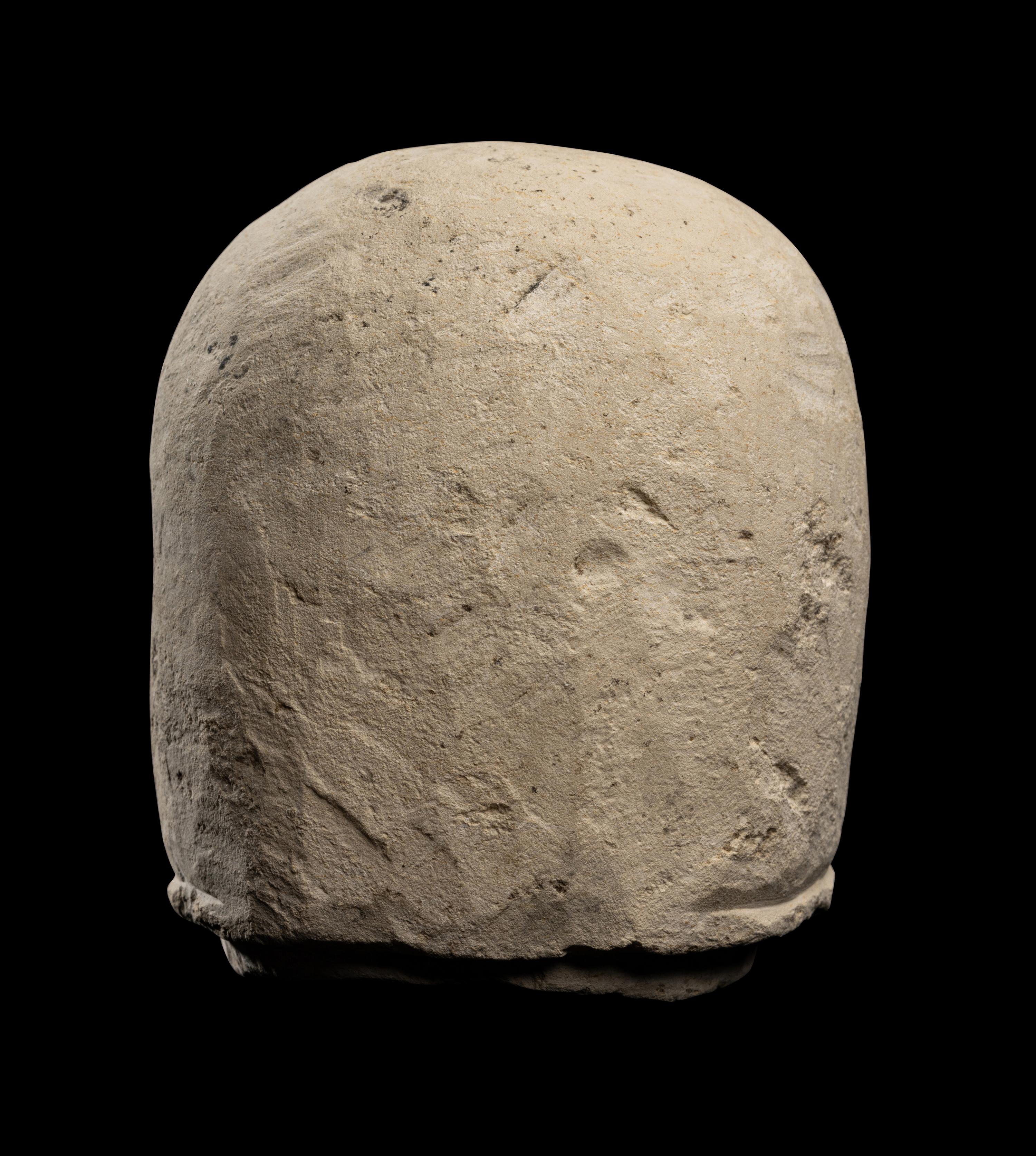 An Egyptian Limestone Canopic Jar Lid for Imseti