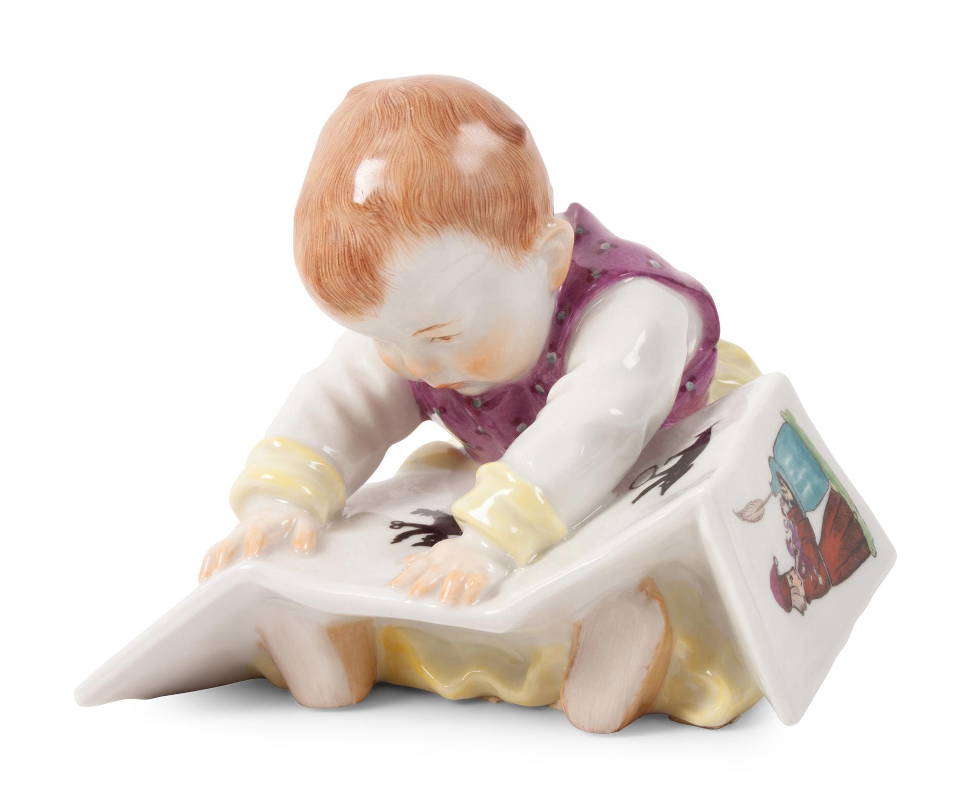A Meissen Porcelain Baby Reading a Book, by Konrad Hentschel