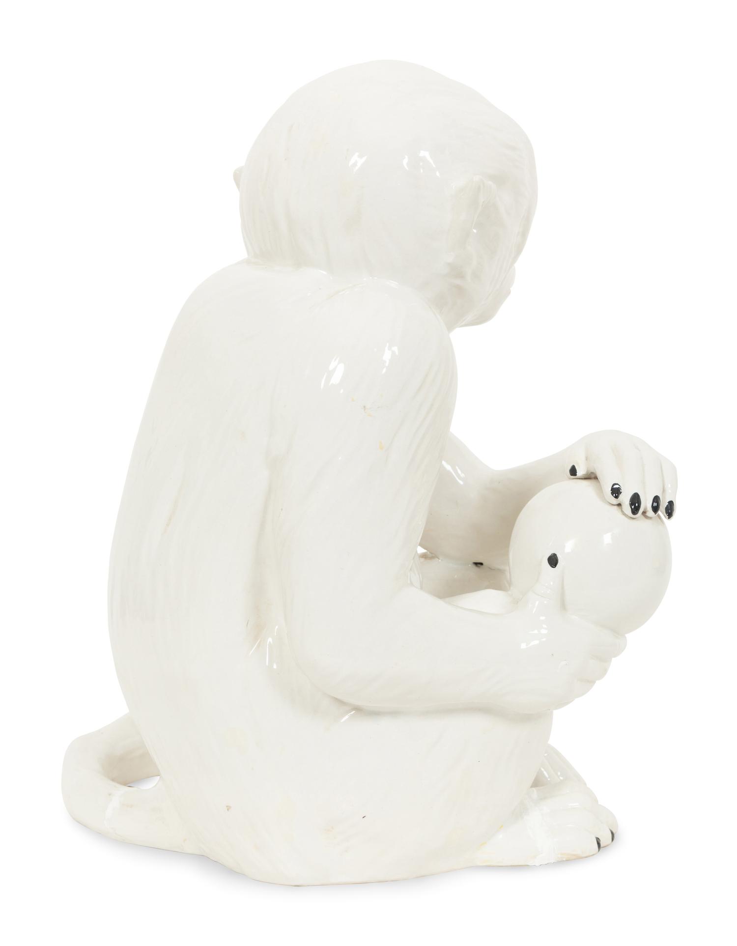 An Italian White Glazed Ceramic Monkey