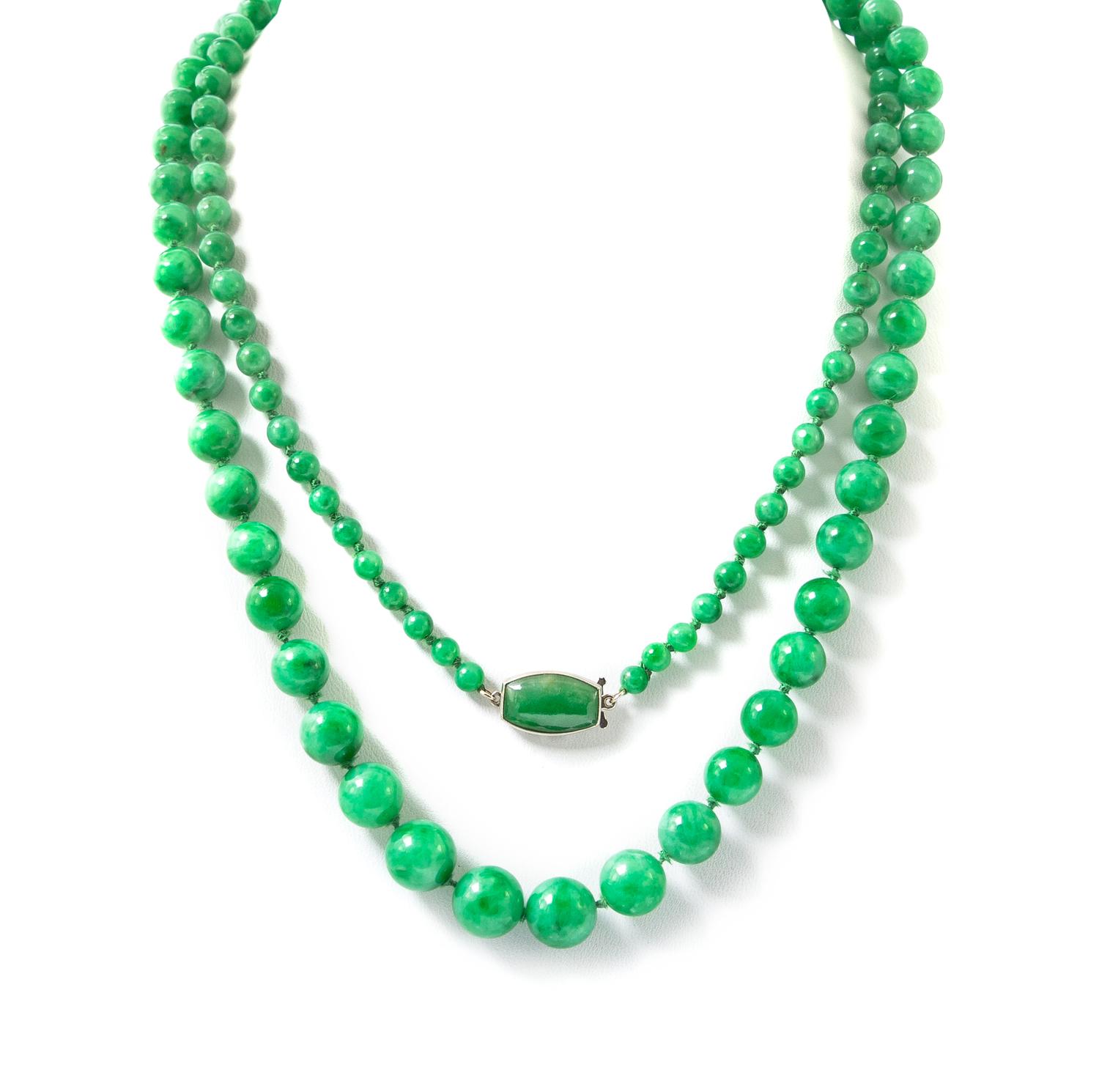 A Single Strand Graduated Jadeite Jade Bead Necklace, 36.40 dwts.
