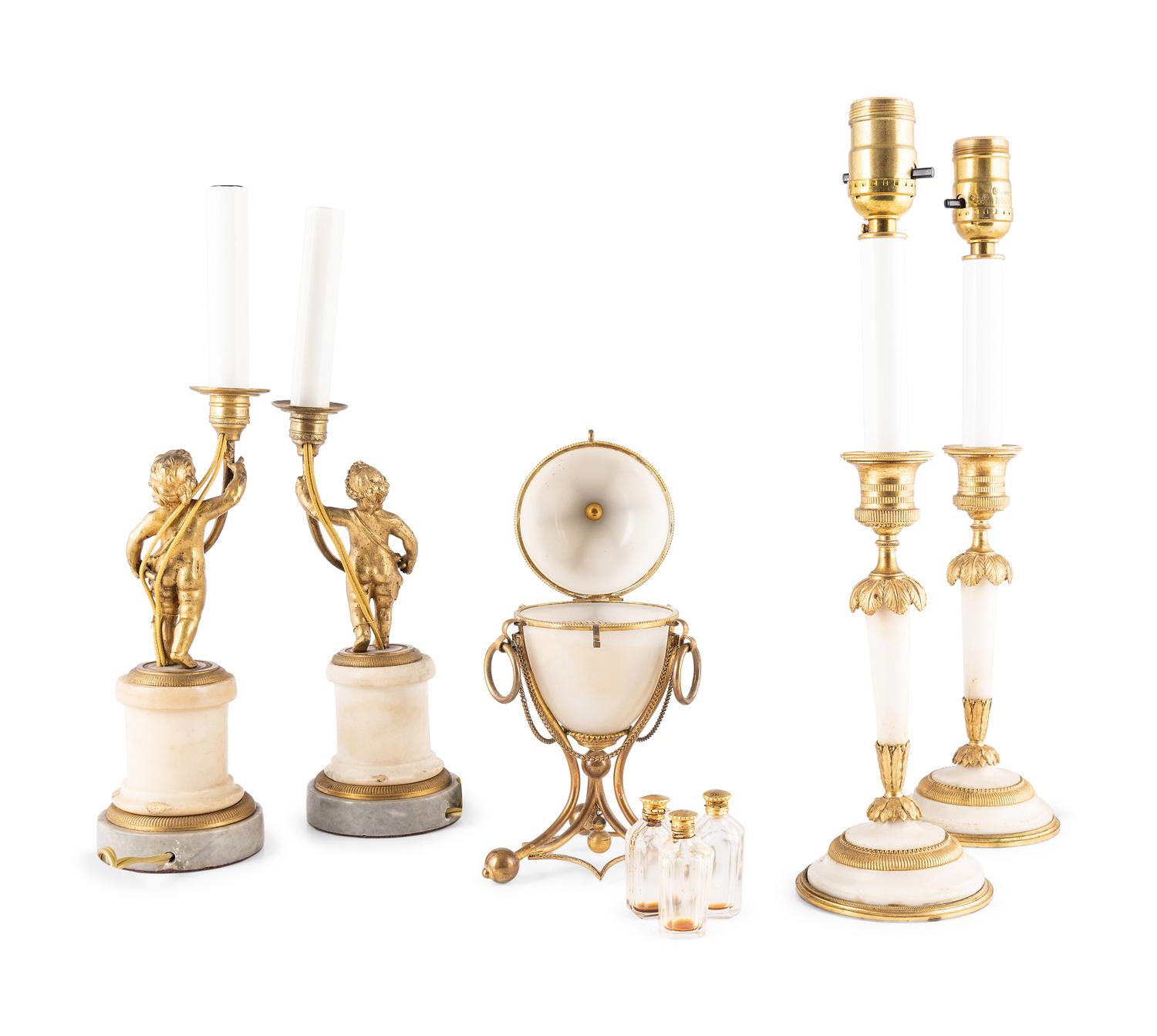 Four Gilt-Metal Mounted Candlesticks and an Opaline Glass Egg-Shaped Scent Casket