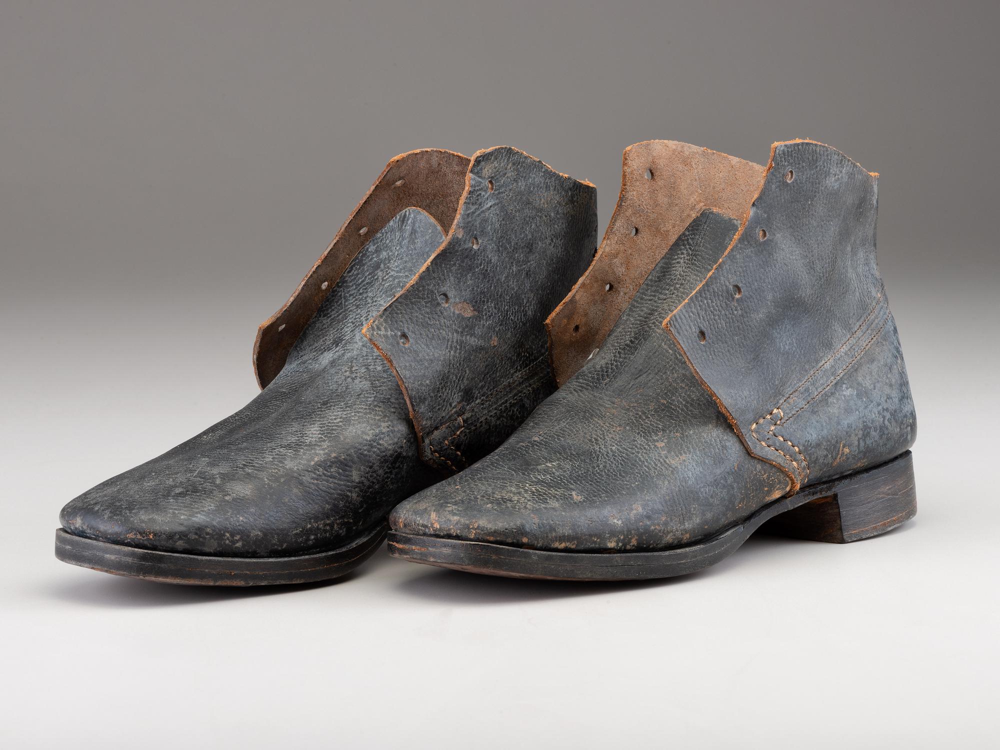 [CIVIL WAR]. A pair of military-issue brogans with a pair of Civil War-period socks.