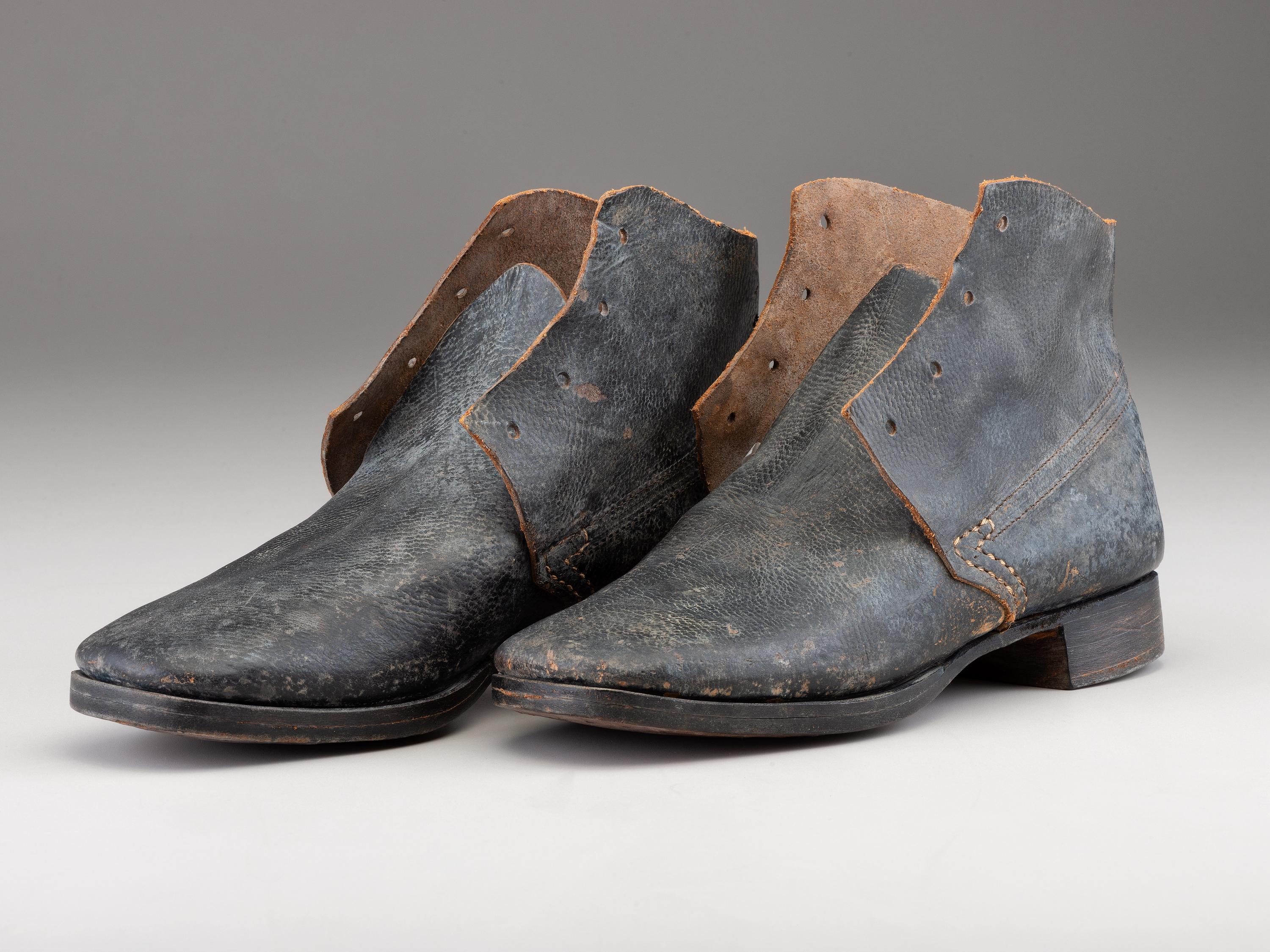 [CIVIL WAR]. A pair of military-issue brogans with a pair of Civil War-period socks.
