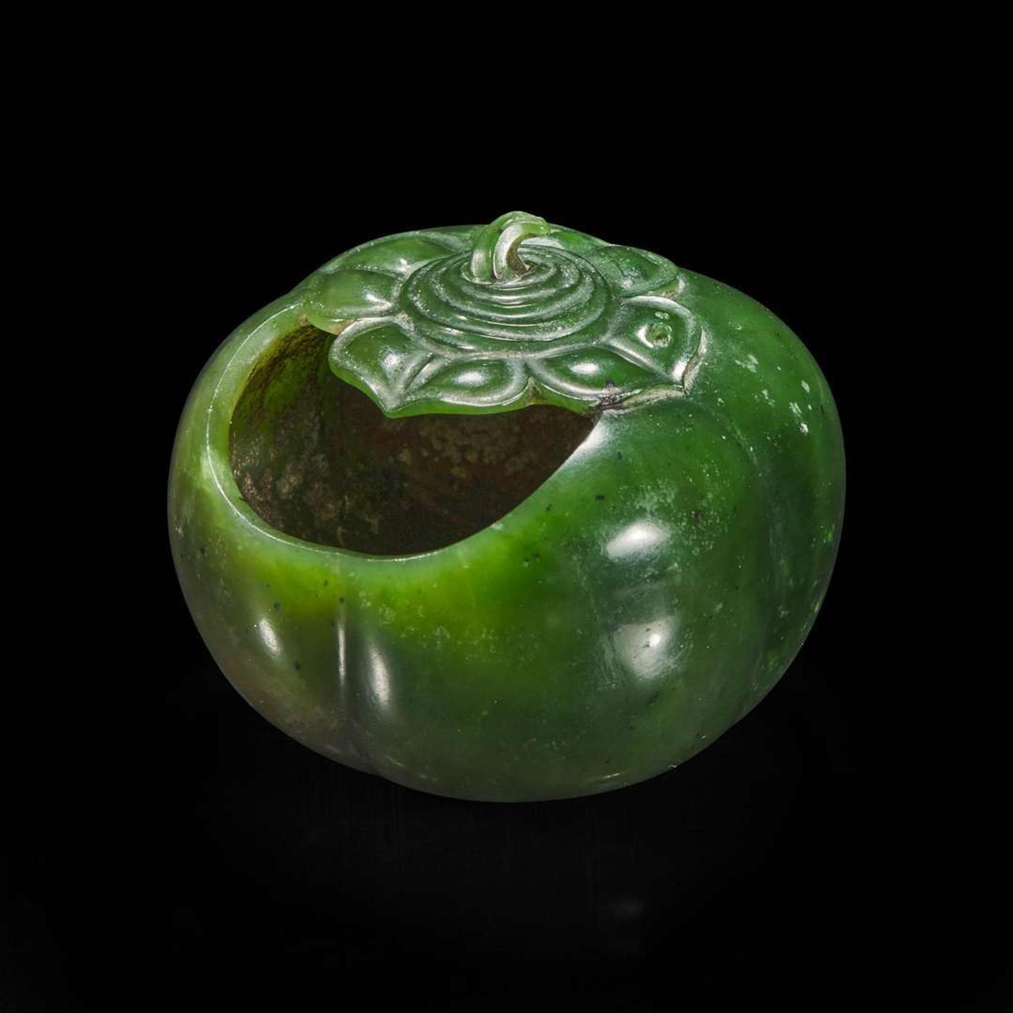 A Chinese carved spinach jade four-lobed persimmon coupe 翠玉四叶柿子形水丞
