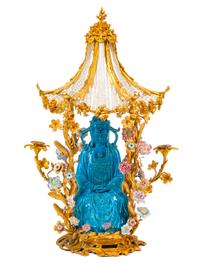 A Louis XV Style Porcelain and Gilt Bronze Pagoda Two-Light Candelabrum