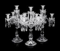 A Set of Three Baccarat Molded Glass Five-Light Candelabra