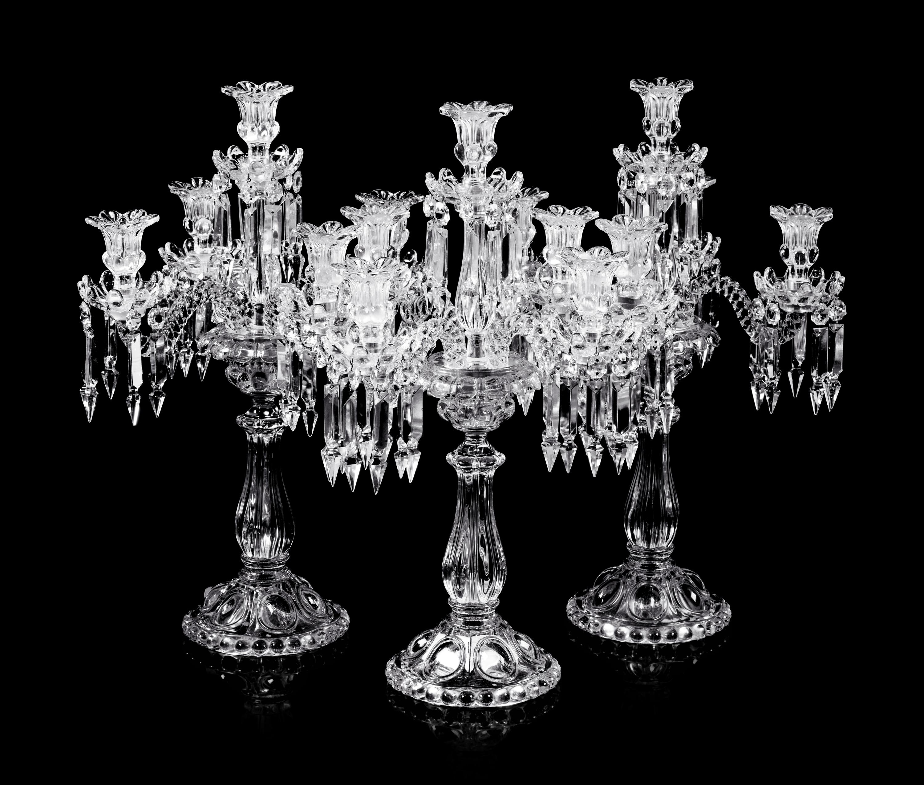 A Set of Three Baccarat Molded Glass Five-Light Candelabra
