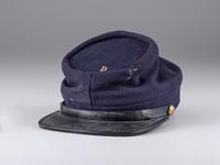 [CIVIL WAR] Private-purchase kepi and painted tintype, identified to Henry McCuen, Company D, 14th NY Heavy Artillery.