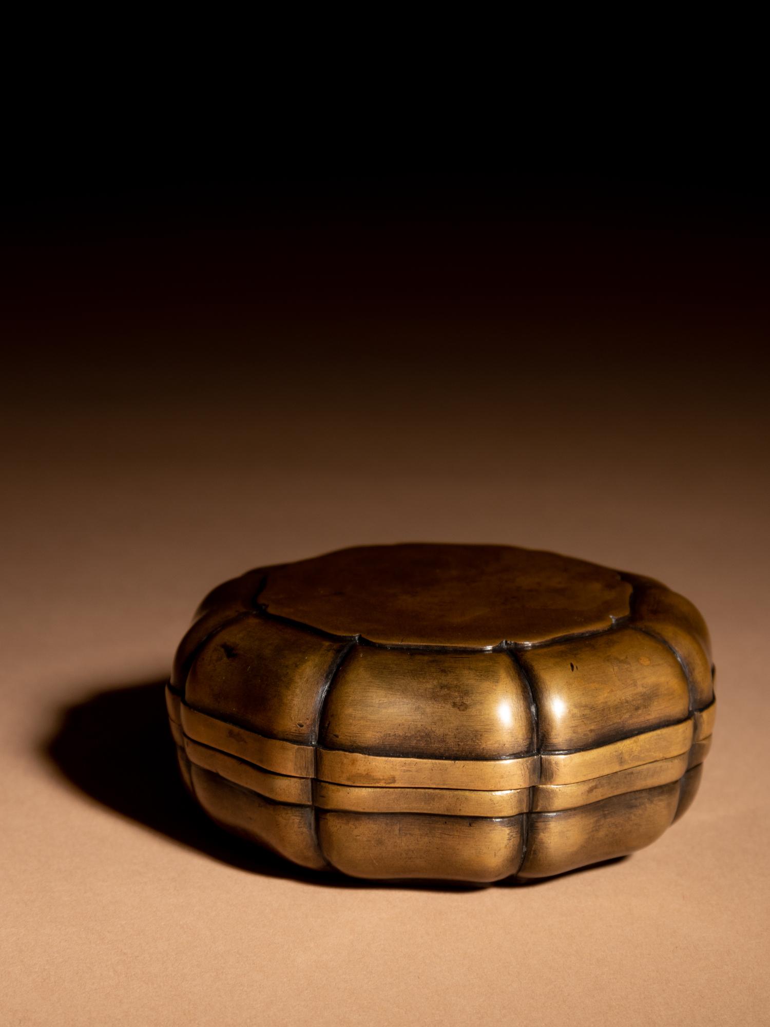 A Bronze Flori-Form Covered Box